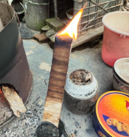 A small wooden stick dipped in wax